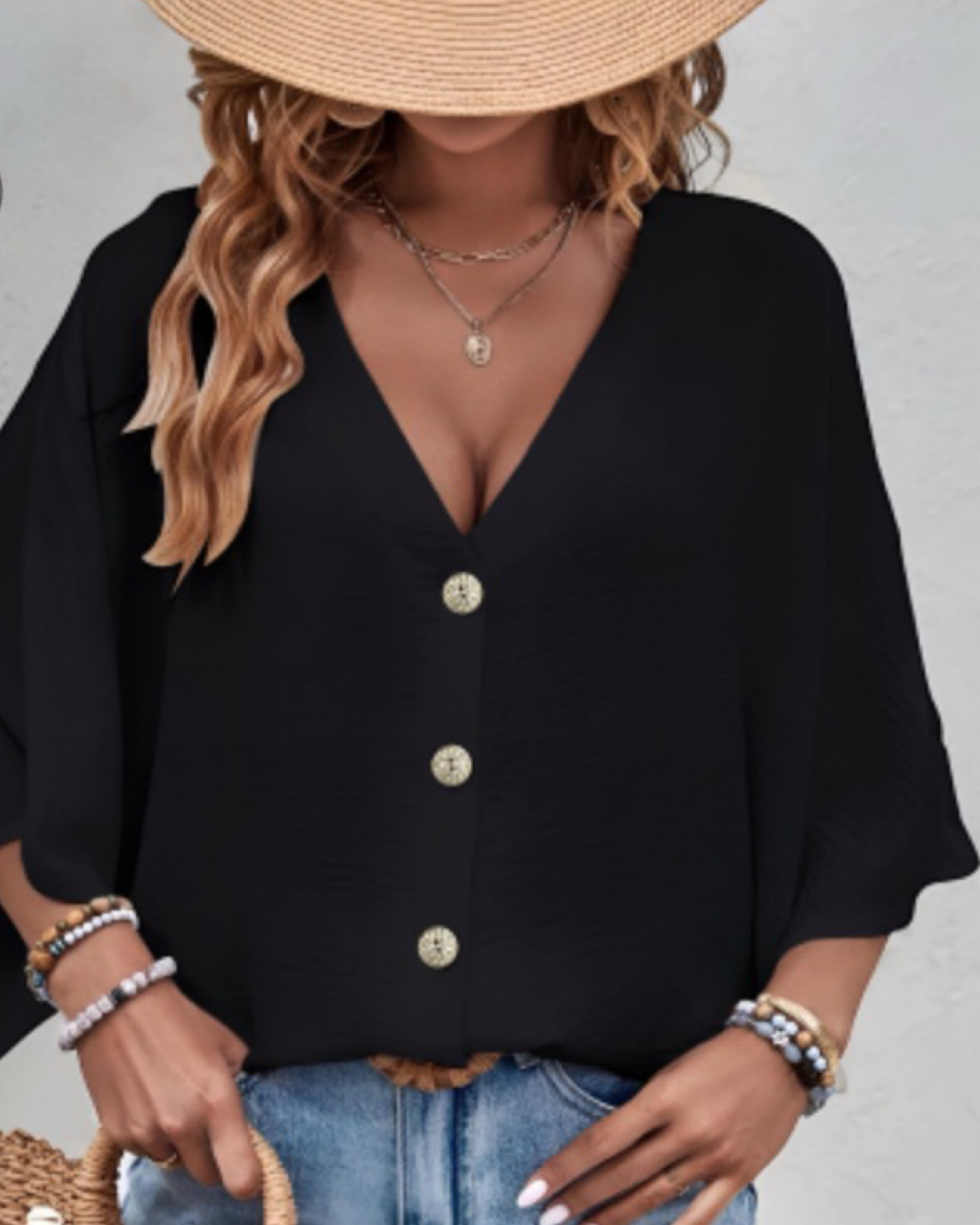 Buttoned shirt top.