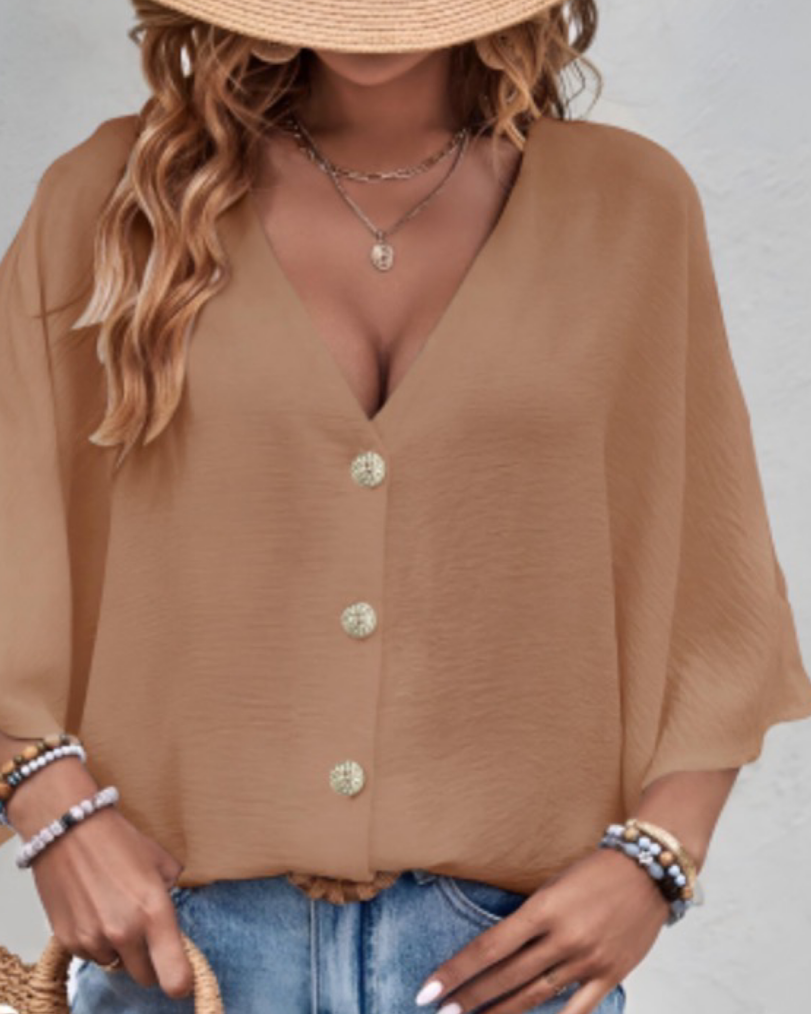 Buttoned shirt top.